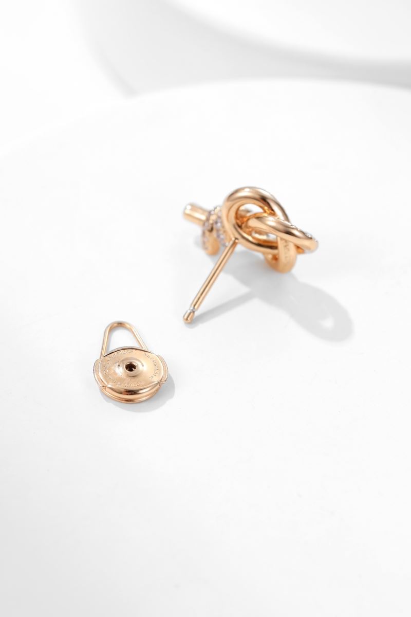 T*f*ny earrings
